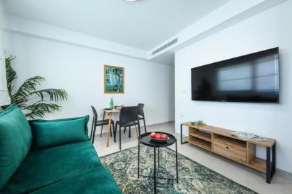 Charming 1BR Apartment with Mamad in Florentin by Sea N' Rent - image 9