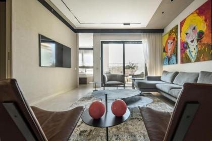 Modern and Vibrant 2BR apartment with Private Balcony by Sea N' Rent - image 14