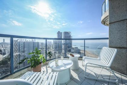 Luxury 2BR Apt w Balcony Pool Access & Beach View by Sea N' Rent - image 3