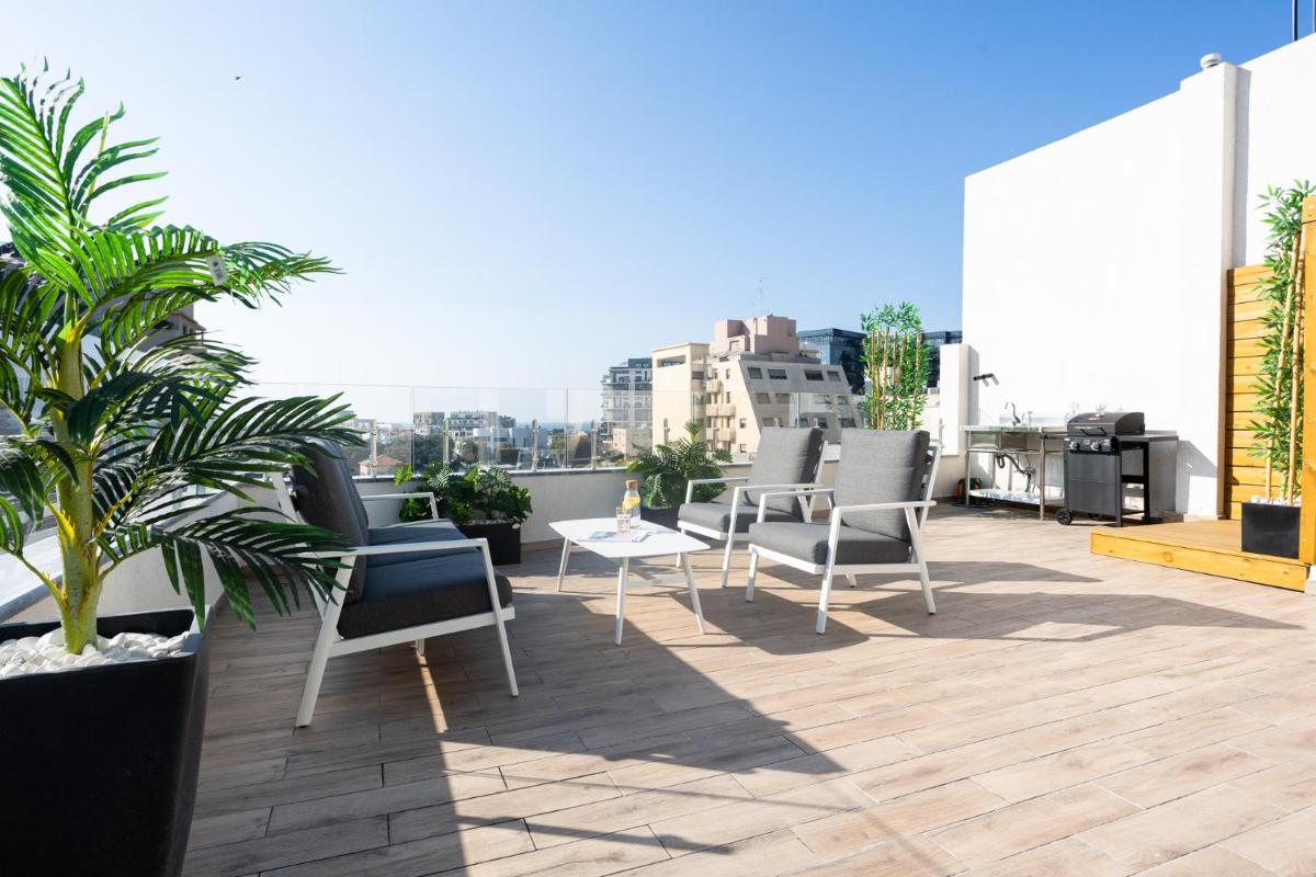 YalaRent Flora- Designed 1BR penthouse in Florentin - main image