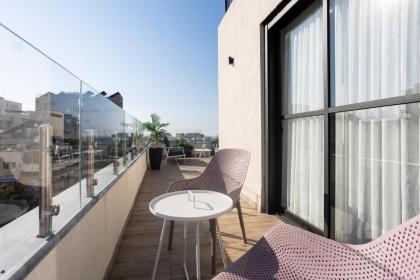 YalaRent Flora- Designed 1BR penthouse in Florentin - image 15