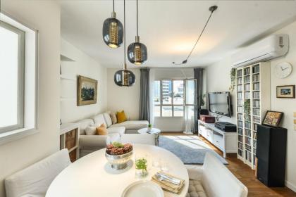 Radiant 1BR Apt w Parking in the Heart of Tel Aviv by Sea N' Rent - image 1