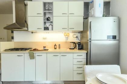 Radiant 1BR Apt w Parking in the Heart of Tel Aviv by Sea N' Rent - image 3