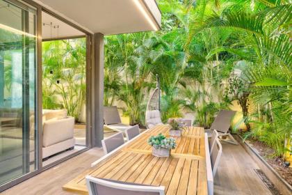 Tranquil 2BR GardenOasis near the Sea by HolyGuest - image 2