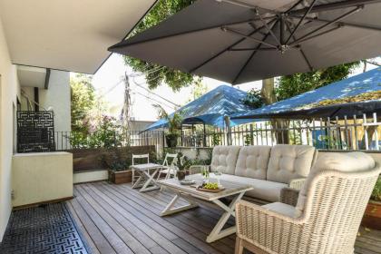Stylish 2BR Apt with Patio in the Heart of Tel Aviv by Sea N' Rent - image 14