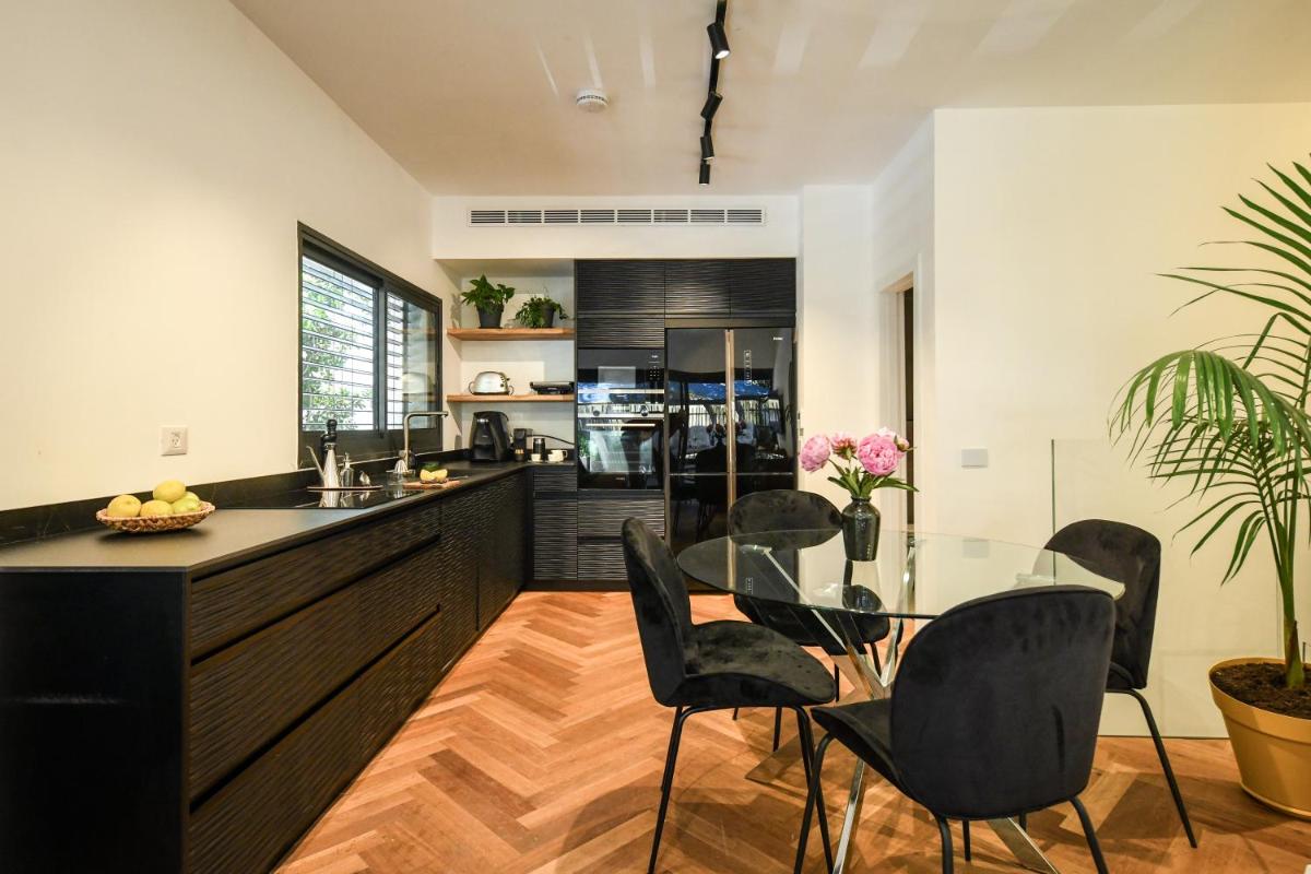Stylish 2BR Apt with Patio in the Heart of Tel Aviv by Sea N' Rent - image 3