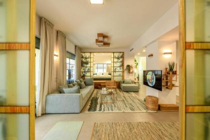 Charming 2BR Apt with a Breathtaking Patio in the Heart of the City by Sea N' Rent - image 11