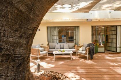 Charming 2BR Apt with a Breathtaking Patio in the Heart of the City by Sea N' Rent - image 8